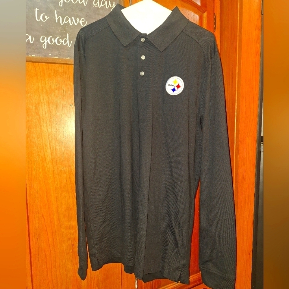 A Cutter Buck Pittsburgh Steelers Men's Black Polo Shirt In A Size XL. EUC